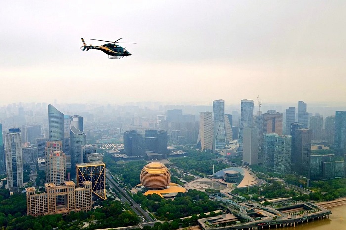 first low-altitude helicopter tour over hangzhou's qiantang river takes flight