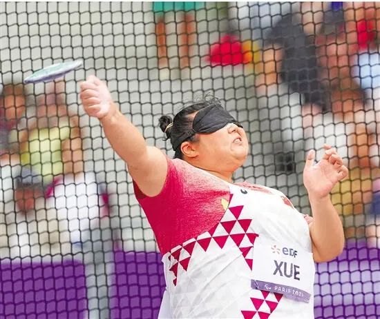 42-year-old hangzhou paralympian xue enhui wins bronze in discus