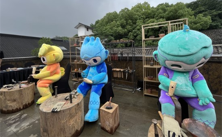 asian games mascots learn from expert copper sculptor